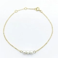 Pulsera minimalista de plata S925 dorada con cuatro perlas de agua dulce blancas - Plata 925 / Dorado