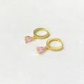 Detailed shot of gold drop earrings with pear-cut pink zircons and micro-pave crystals - Pink Zirconia Gold Color