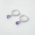 Detail view of S925 silver hoop earrings with pear-cut purple zircon stone pendants - Purple Zirconia Silver Color