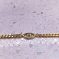 Elegante bracciale occhio greco dorato con zircone blu e catena piatta cubana - Argento 925 / Oro