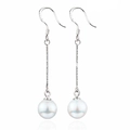 Elegant S925 sterling silver long drop earrings with white natural shell pearls on white background - 925 Silver / White
