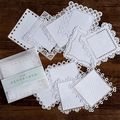 Vintage white lace paper set with delicate floral cutouts for DIY scrapbooking - Lace Handkerchief Style