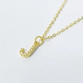 Golden S925 silver letter J necklace with sparkling cubic zirconia on white background - Letter J / 925 Silver Gold Plated