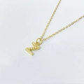 Detailed view of gold Z-letter pendant with pave-set cubic zirconia on a dainty chain - Letter Z / 925 Silver Gold Plated