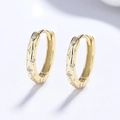 Orecchini a cerchio in argento 925 dorato con zirconi e motivi a stella lucenti - Argento 925 / Oro