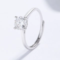 Adjustable 925 sterling silver ring with a four-prong set round moissanite stone - Adjustable Open / Four-Prong Solitaire Style