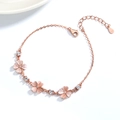 Detalle de pulsera de plata 925 oro rosa con tréboles rosas y el sello S925 - Plata 925 / Oro Rosa (Piedra Blanca)