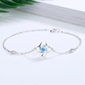 S925 Sterling Silber Kleeblatt Armband mit hellblauem Edelstein und Zirkonia Steinen - Platin (Blauer Zirkonia)