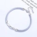 Pulsera Mobius de plata de ley 925 con cordón trenzado lila y grabado No.52 - Plata 925 / Azul claro