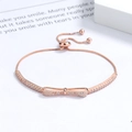 Rose gold bow bracelet with white zircon and adjustable pull-chain slide clasp - 925 Silver / Rose Gold