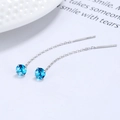 Eleganti orecchini nappa in argento 925 con zircone blu e incastonatura a quattro griffe - Blu Acqua