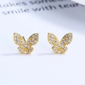 Boucles d'oreilles papillon dorées avec ailes serties de zircons cubiques brillants - Or