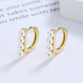 Elegante s925 zilveren gouden oorringen met vier verticale witte parels in minimalistische stijl - 925 zilver / Goud