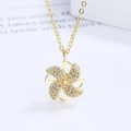 Elegant rotating gold windmill necklace with shimmering zircon pavé petals and fine link chain - 925 Silver / Gold