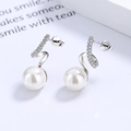 Orecchini a onde in argento 925 con zirconi e perle bianche rotonde ed eleganti - Oro Bianco