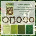 Set de papel para scrapbooking tema hojas verdes con marcos calados decorativos - El viento descansa sobre la madera y las hojas