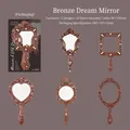 Retro bronze mirror style scrapbooking cardstock with ornate hollow designs and fine textures - Bronze Dream Mirror