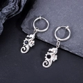 Close-up of seahorse shaped stainless steel earrings with black gemstone inlay details - Seahorse Pendant Ear Clips (One Pair)
