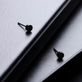 Minimalist matte black round stud earrings for men with sleek 2025 modern finish - Black