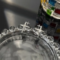 Elegantes pendientes de estrella en plata con diseño de cruz y circonitas brillantes - Estrella Radiante (X233-A)