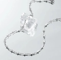 Sleek silver cross link chain necklace draped over an ice block on a mirror background - Cross Style (L221-A)
