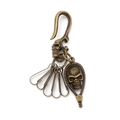 Vintage bronze skull keychain featuring large U-hook, four key rings, and skull pendant - Bronze