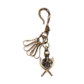 Vintage brass skull and crossed swords keychain with arc hook and five key rings - Bronze