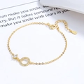 925 Sterling Silber vergoldetes Armband mit glitzerndem Zirkonia-Anhänger auf weißem Grund - 925er Silber / Gold
