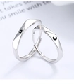 Detailed macro view of S925 silver sun and moon couple rings with adjustable bands - Adjustable Open / Silver - Female (Moon Design)