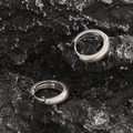 Silver hoop earrings with beaded textured finish and clicker closure on rock surface - Starry Ear Buckle / Frosted Silver (Pair)