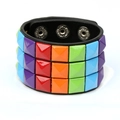Detail view of punk leather bracelet featuring three rows of colorful pyramid studs - Multicolor Studs