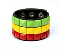 Detailed shot of punk leather bracelet with triple rows of green yellow and red studs - Green Yellow Red