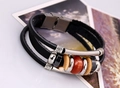 Macro detail of layered leather bracelet with metallic beads and magnetic clasp - Black