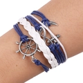 Bracciale multistrato nautico con ciondoli ancora, infinito e timone in blu e bianco - Intrecciato Blu Bianco Nautico