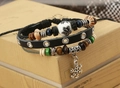 Detail of multi-layer leather bracelet with coconut tree bead and snowflake charm - Black
