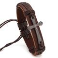 Vintage brown leather bracelet with a black cross charm featuring engraved Lord’s Prayer - Brown