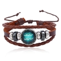 Detail of multi-layer leather bracelet featuring an Aquarius zodiac sign glass charm - Aquarius