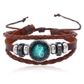 Detail of Capricorn leather bracelet with zodiac charm and adjustable braided cord - Capricorn