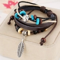 Multilayer leather beaded bracelet set featuring silver feather pendant and blue wooden beads - Brown