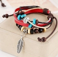 Bohemian multilayer leather bracelet with red beads and silver feather pendant - Red