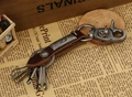 Vintage dark brown leather keychain with elephant buckle and zinc alloy skull hook - Brown