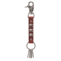 Punk style leather skull keychain with silver rivets and vintage snap hooks on white backdrop - Brown