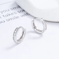 925 silver hoop earrings featuring square-cut sparkling zircons in a 45-degree angle view - 925 Silver / White Gold/Pair
