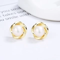 Élégantes boucles d'oreilles fleur en argent 925 et perle avec finition dorée raffinée - Argent 925 / Or
