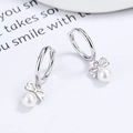 Orecchini a farfalla in argento 925 con perle bianche lucide e design elegante - Argento 925 / Oro Bianco