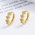 Glänzende goldene Kleeblatt-Ohrringe mit Zirkonia-Besatz für elegante Damen - 925er Silber / Gold/Paar
