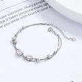 Pulsera de plata de ley 925 con colgante de pata de gato rosa y cuentas de plata mate - Plata 925 / Oro blanco