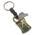 Détail du porte-clés Balance avec médaillon en bronze antique et cordon en cuir - Balance