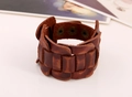 Detail of vintage dark brown braided genuine leather wide bracelet with bronze snap buttons - Brown