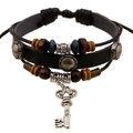 Bohemian multilayer leather bracelet with wooden beads and a vintage key pendant - Key Pendant Style